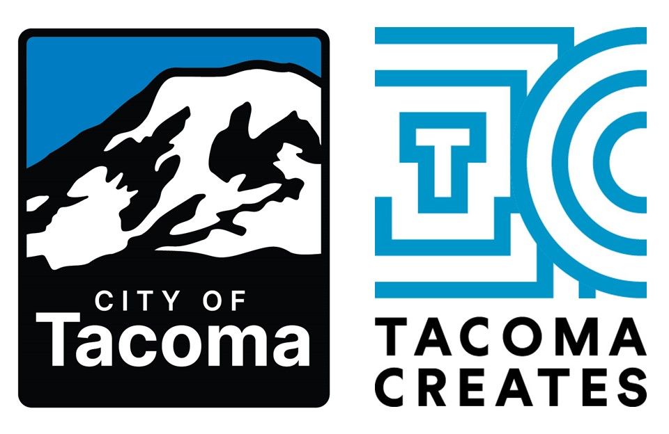 A tacoma creates logo on a blue background