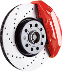 Red automotive brake disc with silver rotor and red brake caliper on white background