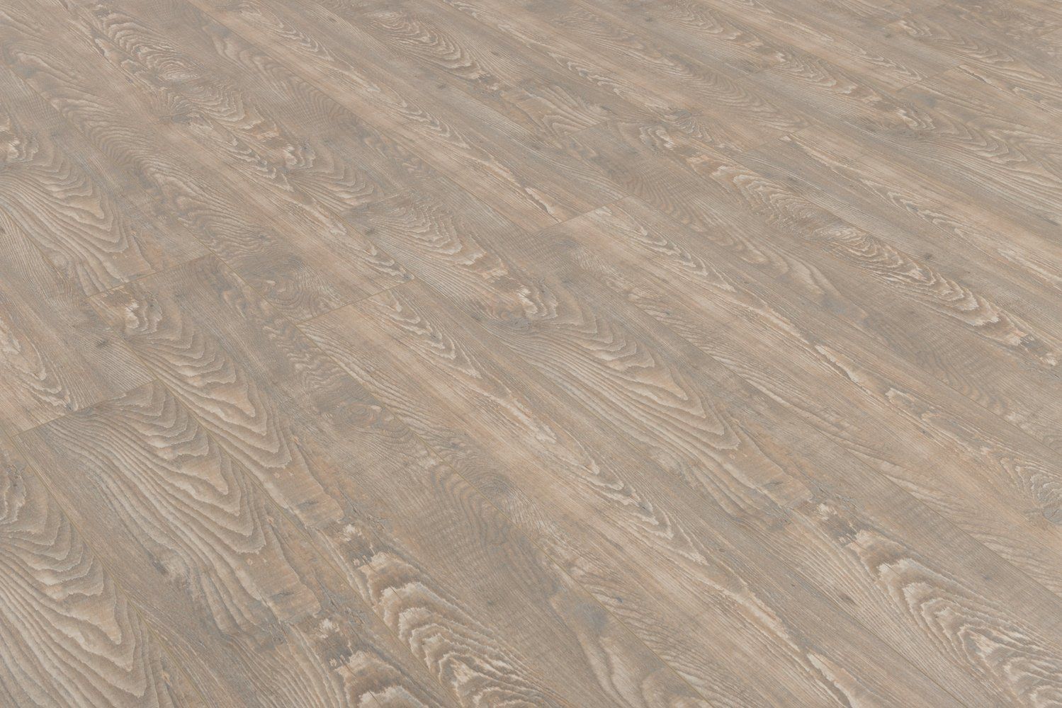 A close up of a wooden floor in a room.