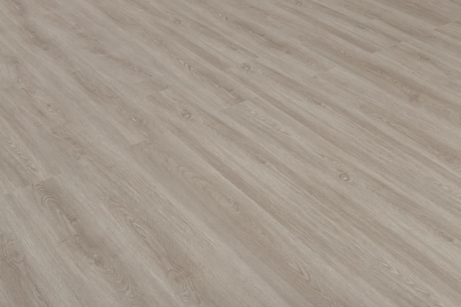 A close up of a wooden floor with a diagonal pattern.