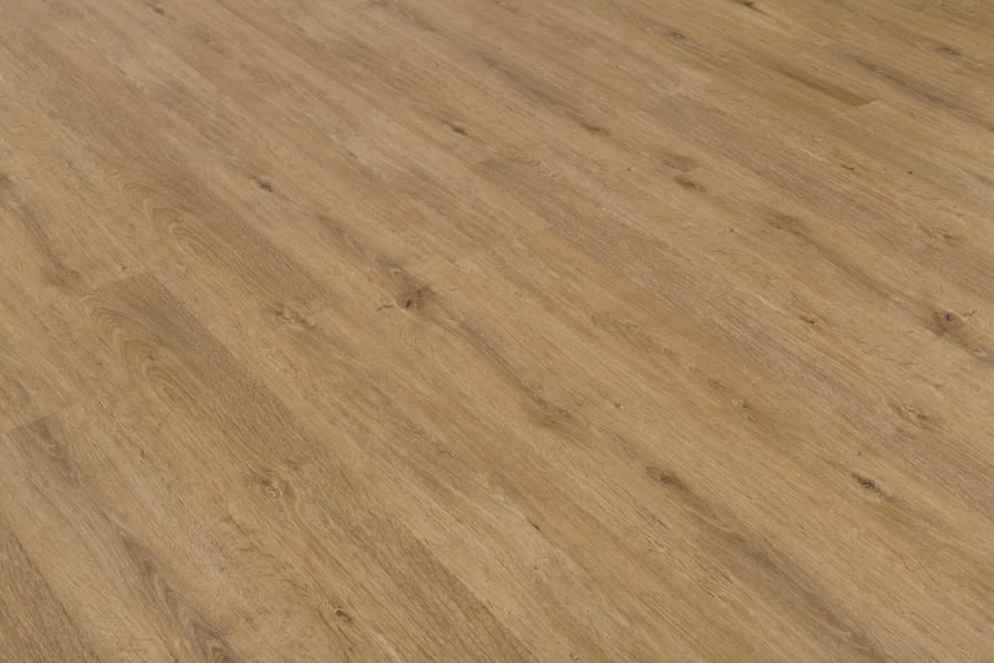 A close up of a wooden floor in a room.