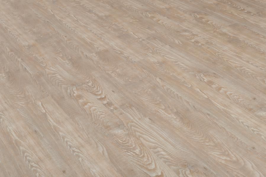 A close up of a wooden floor in a room.