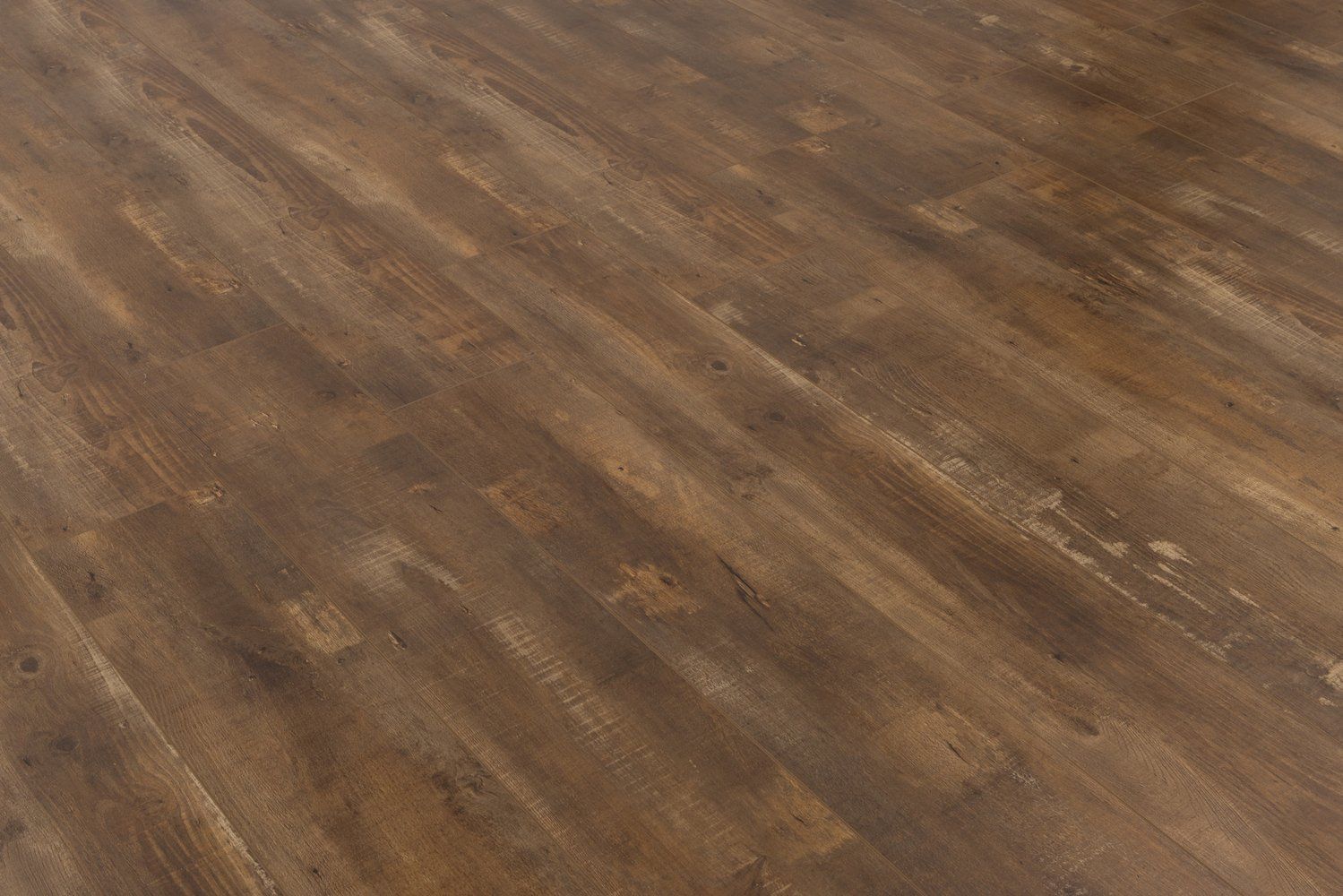 A close up of a wooden floor in a room.