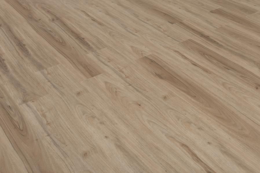 A close up of a wooden floor in a room.