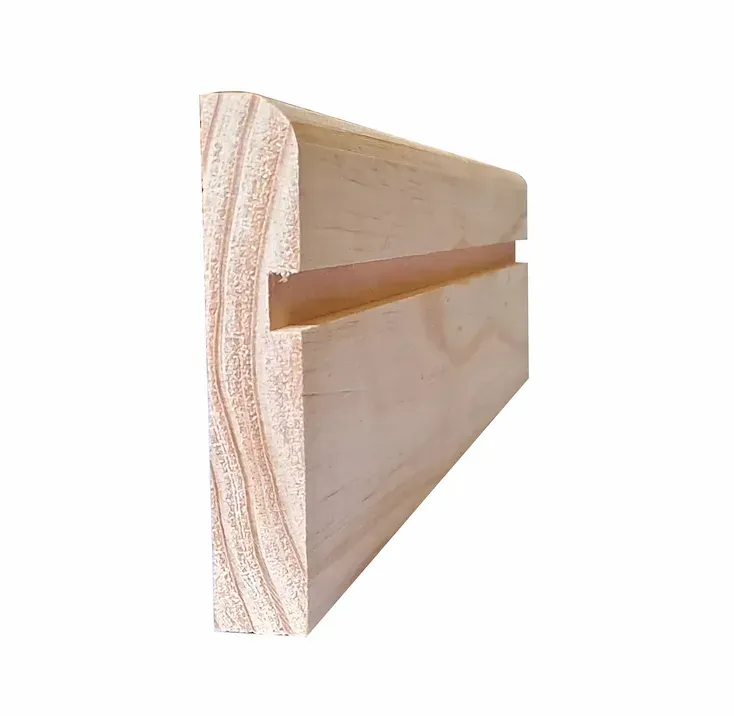A piece of wood with a hole in the middle on a white background.
