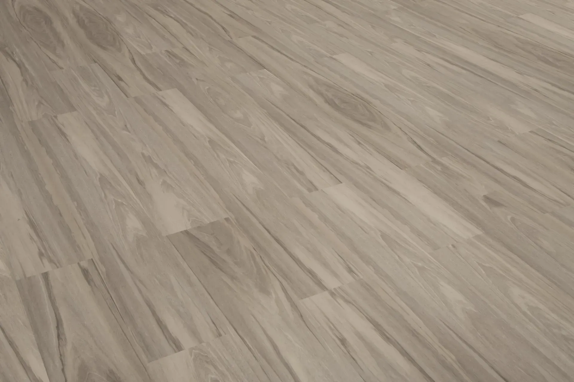 A close up of a wooden floor in a room.