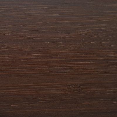 A close up of a piece of wood showing the texture of the wood.