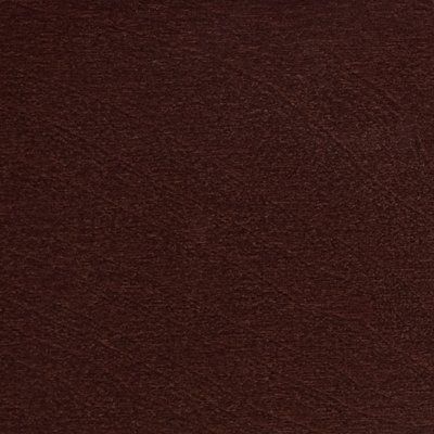 A close up of a brown carpet texture.