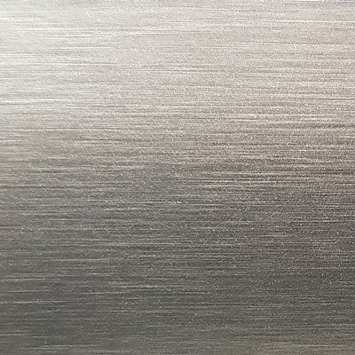 A close up of a stainless steel surface with a brushed finish.