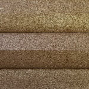 A close up of a piece of brown fabric.