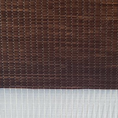 A close up of a brown fabric with white stripes