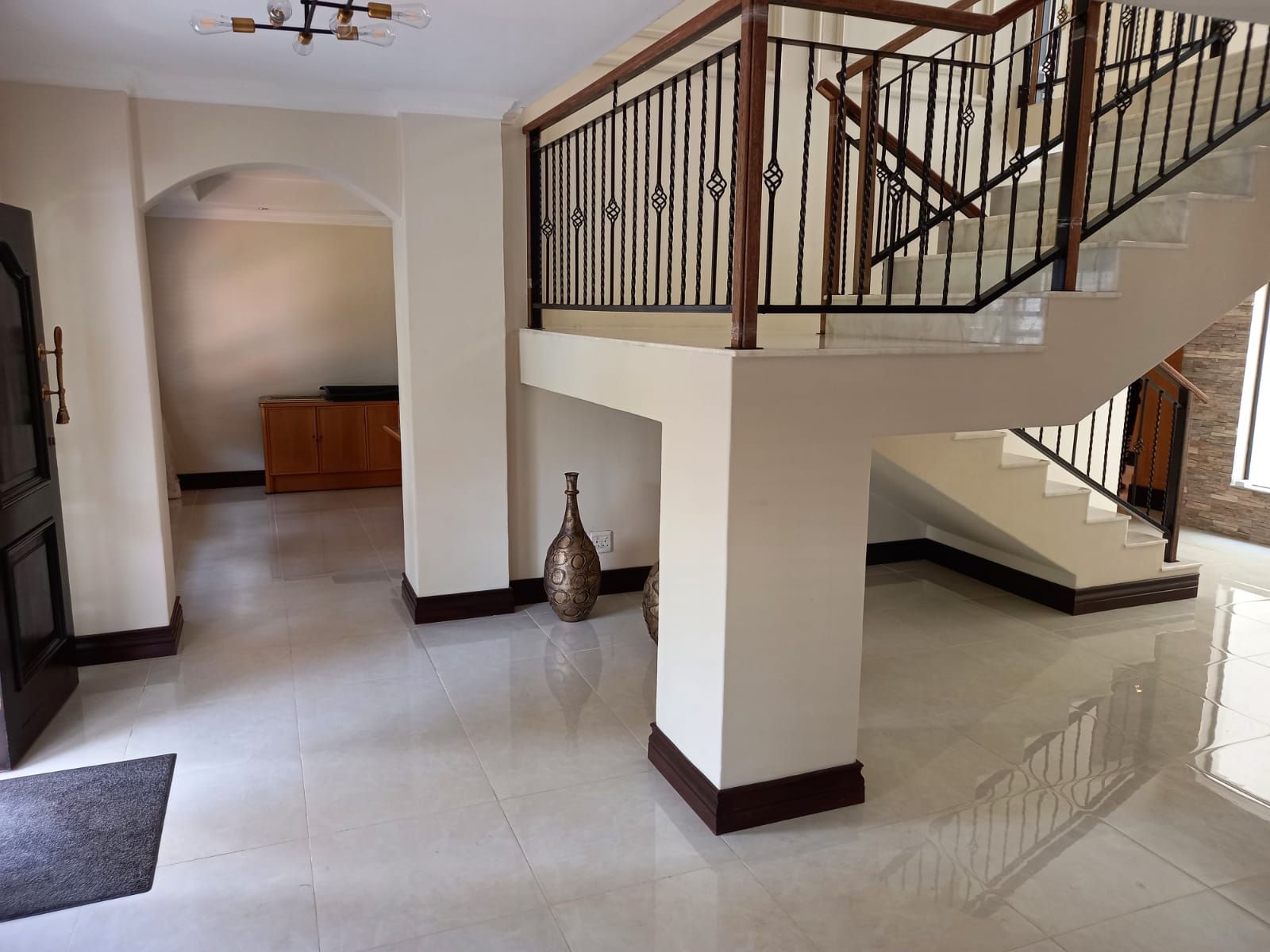 There is a staircase in the middle of the room.