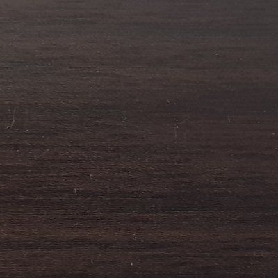 A close up of a piece of dark wood.