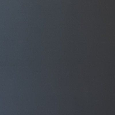 A close up of a gray background with a gradient.