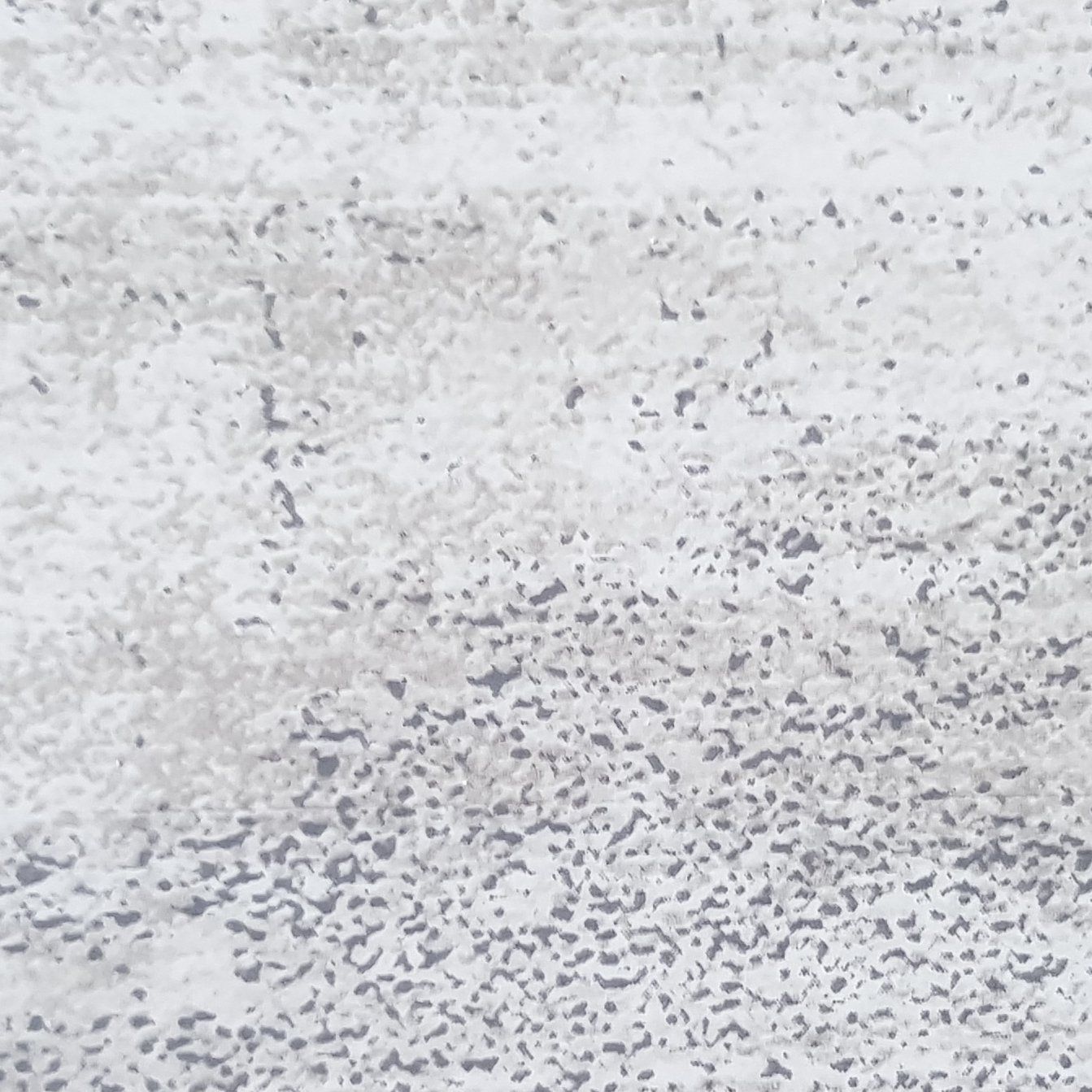 A close up of a gray and white marble texture.