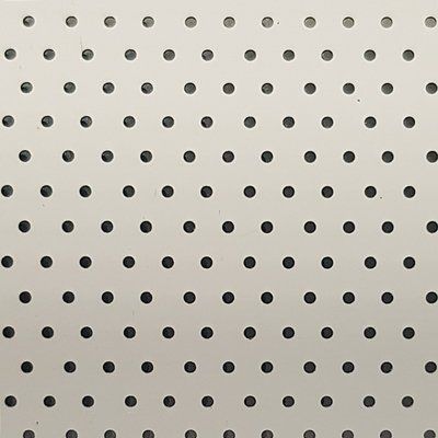 A white background with black polka dots on it