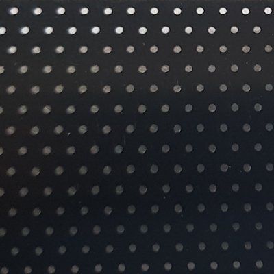 A black background with white polka dots on it