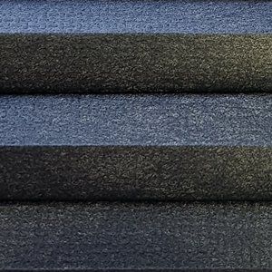 A close up of three pieces of fabric stacked on top of each other.