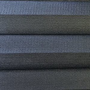 A close up of a piece of fabric that looks like a carpet.