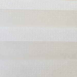 A close up of a white fabric with a striped pattern.
