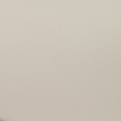 A close up of a white paper texture.