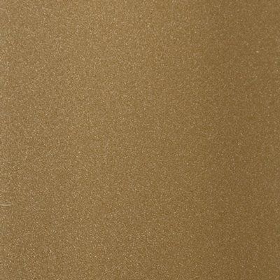 A close up of a piece of brown paper with a grainy texture.