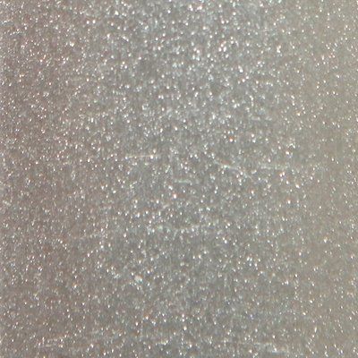 A close up of a white glittery surface