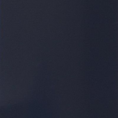 A close up of a dark blue background with a plain texture.