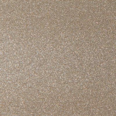 A close up of a piece of paper with a grainy texture.