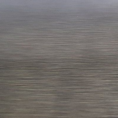 A close up of a body of water with a blurred background.