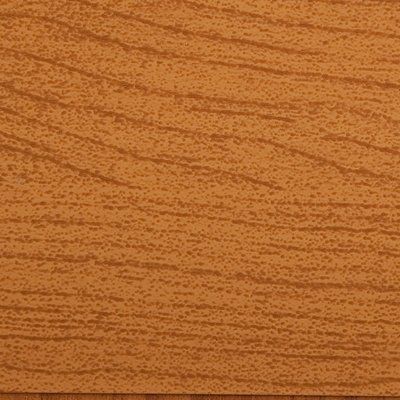 A close up of a piece of wood showing the texture of the wood.