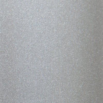 A close up of a white surface with a grainy texture.