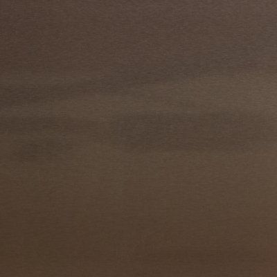 A close up of a brown paper texture.