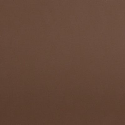 A close up of a brown paper texture.