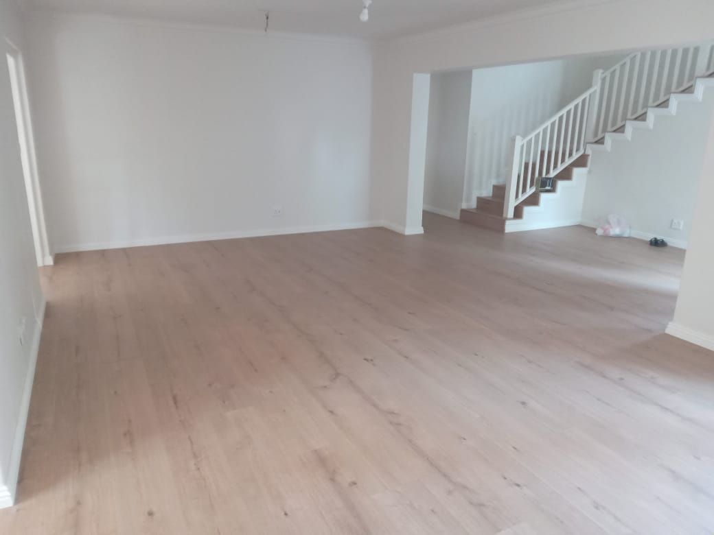 There is a staircase in the middle of the room.