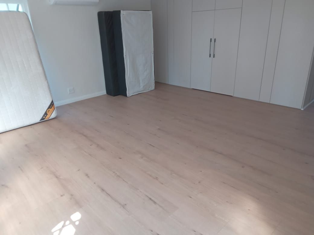 There is a mattress in the middle of the room.