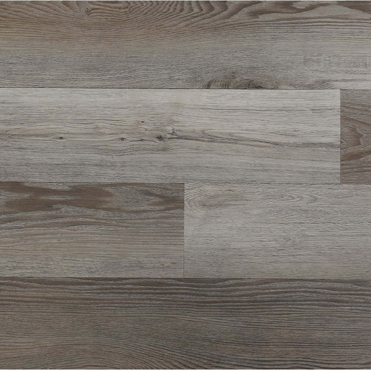 A close up of a wooden floor with a gray and brown grain.