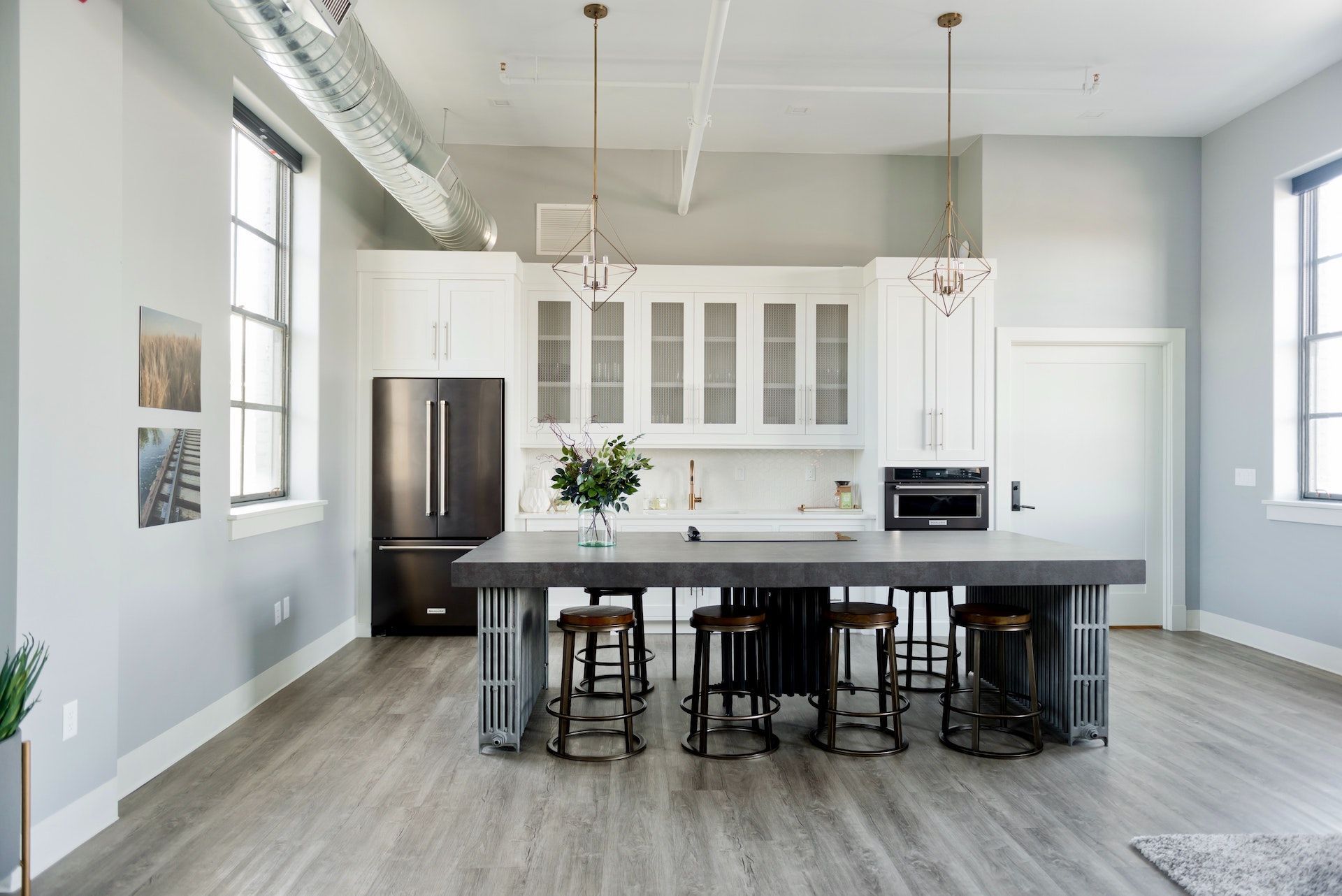 There is a large island in the middle of the kitchen.