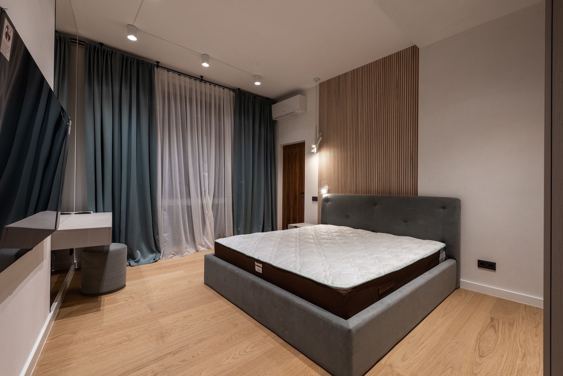 There is a large bed in the middle of the room.