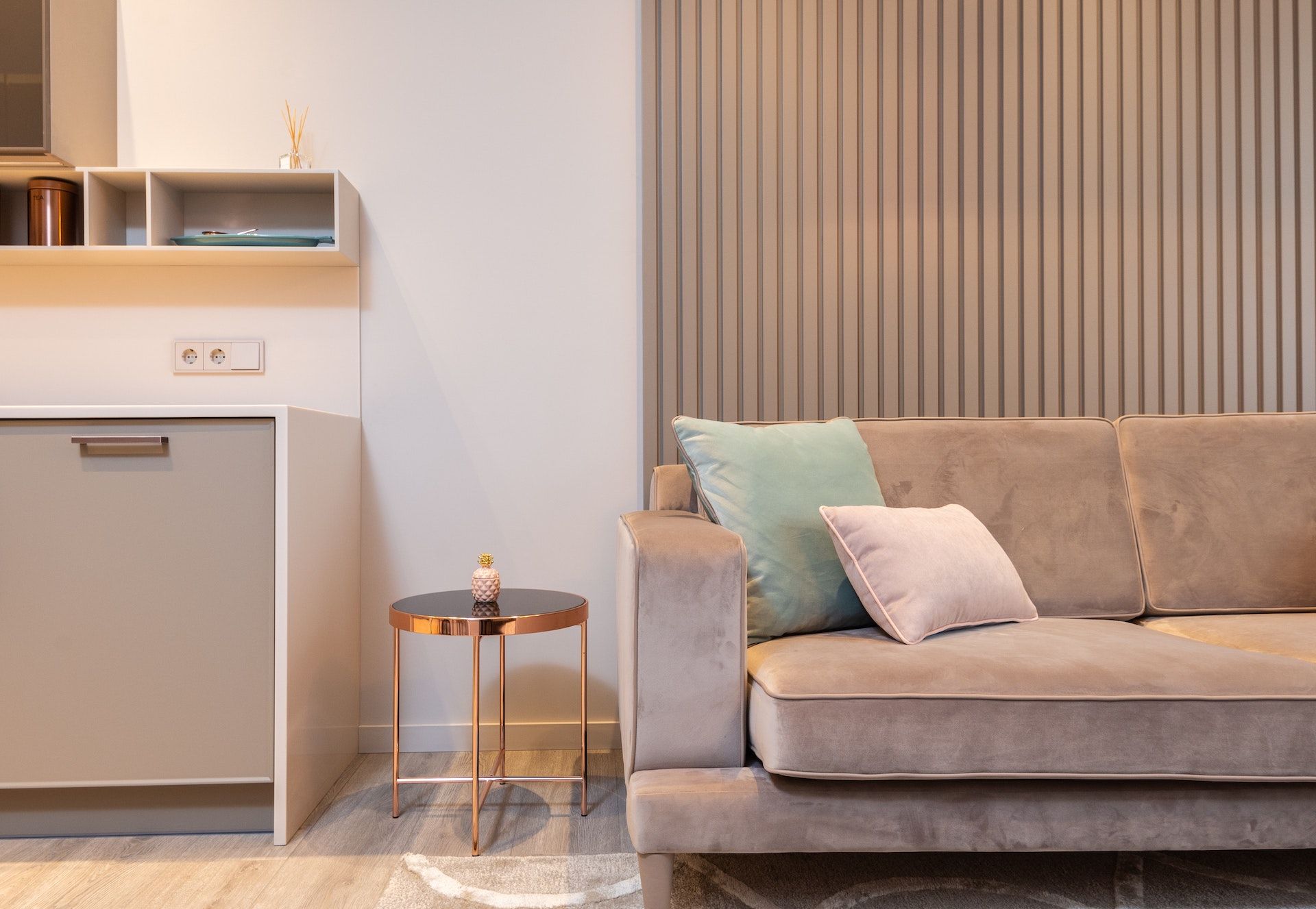 A living room with a couch and a small table.