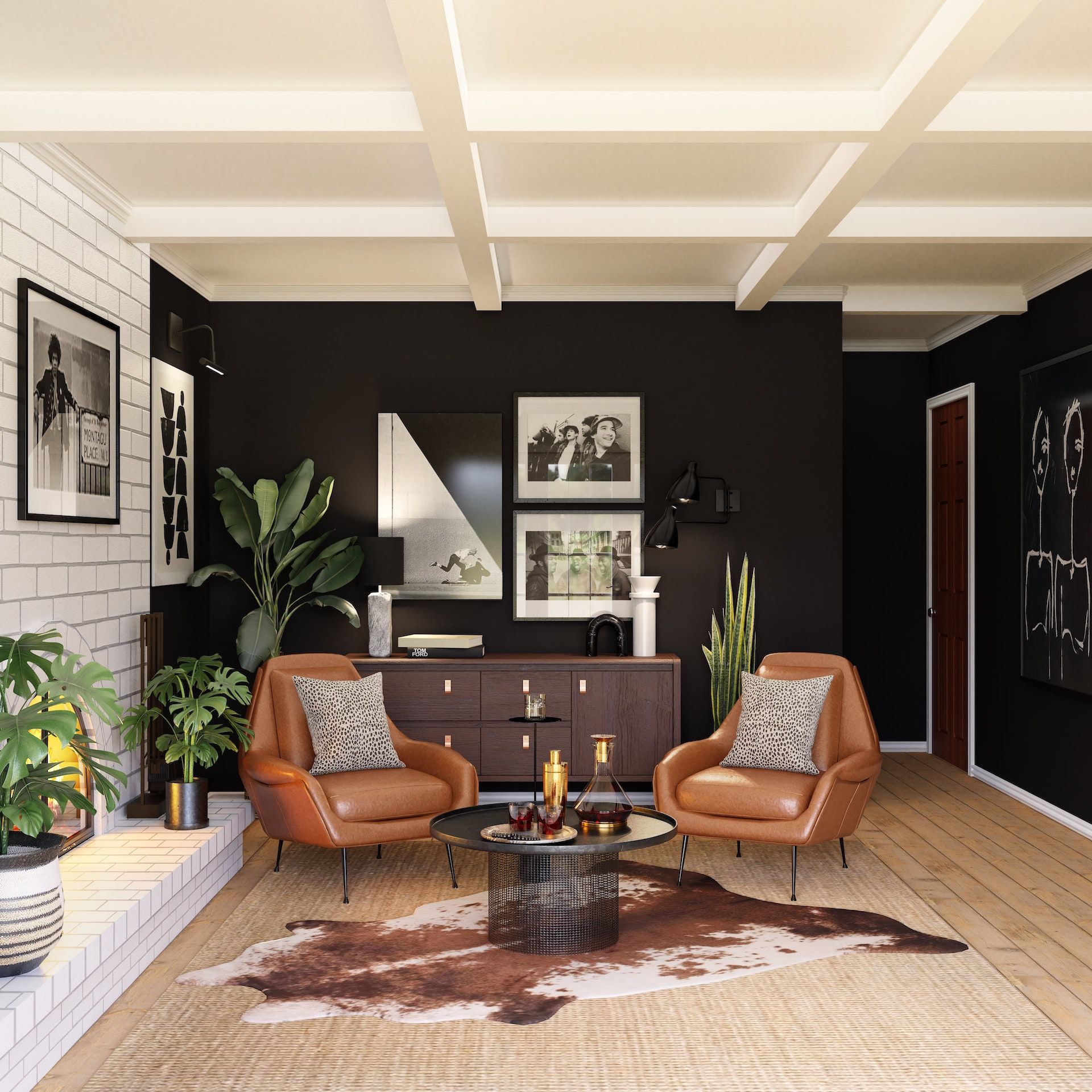 A living room with black walls and brown chairs