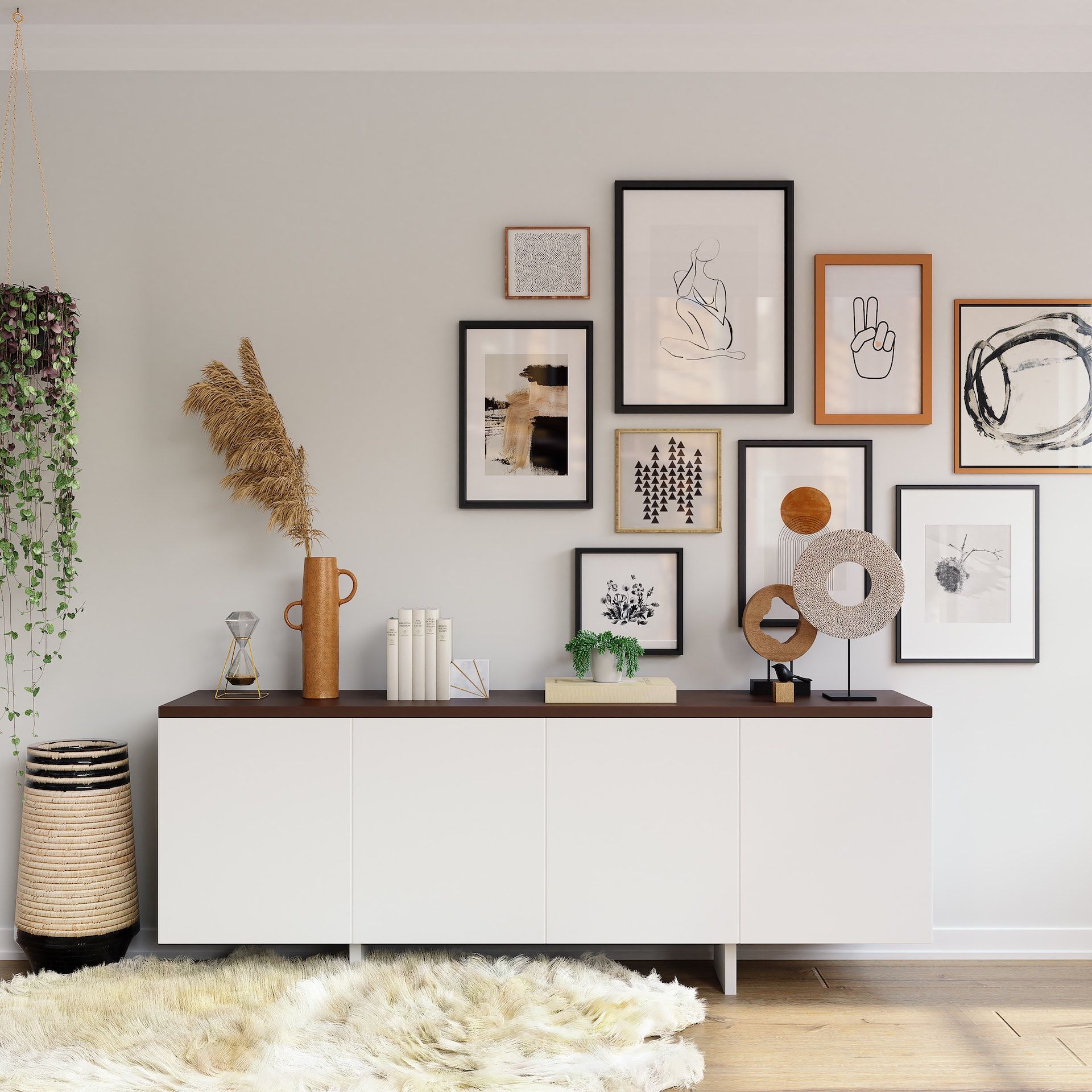 A living room with lots of pictures on the wall