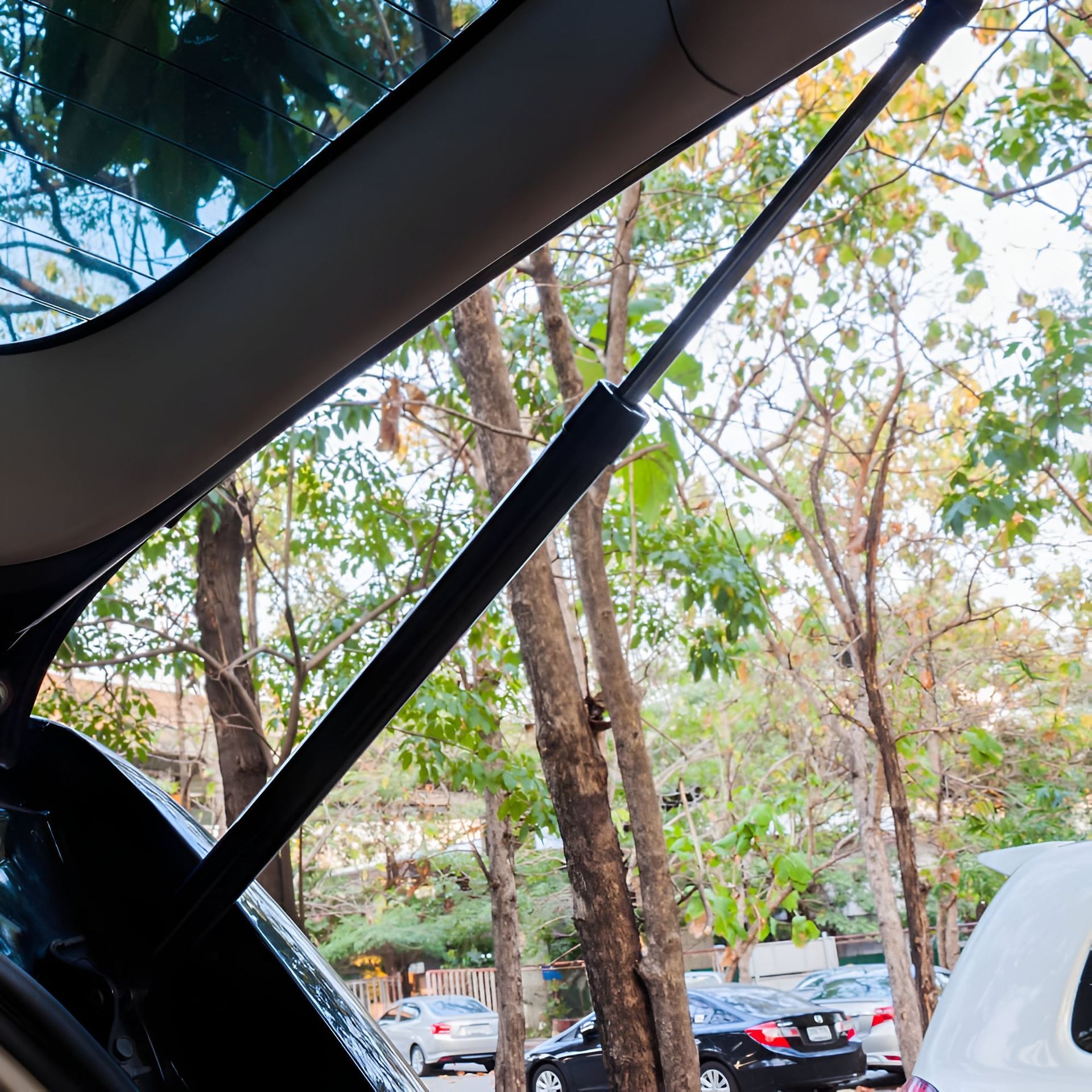A Chrome Door Handle With Two Keys Attached to It — Strut Re-gas Mackay In Ooralea, QLD