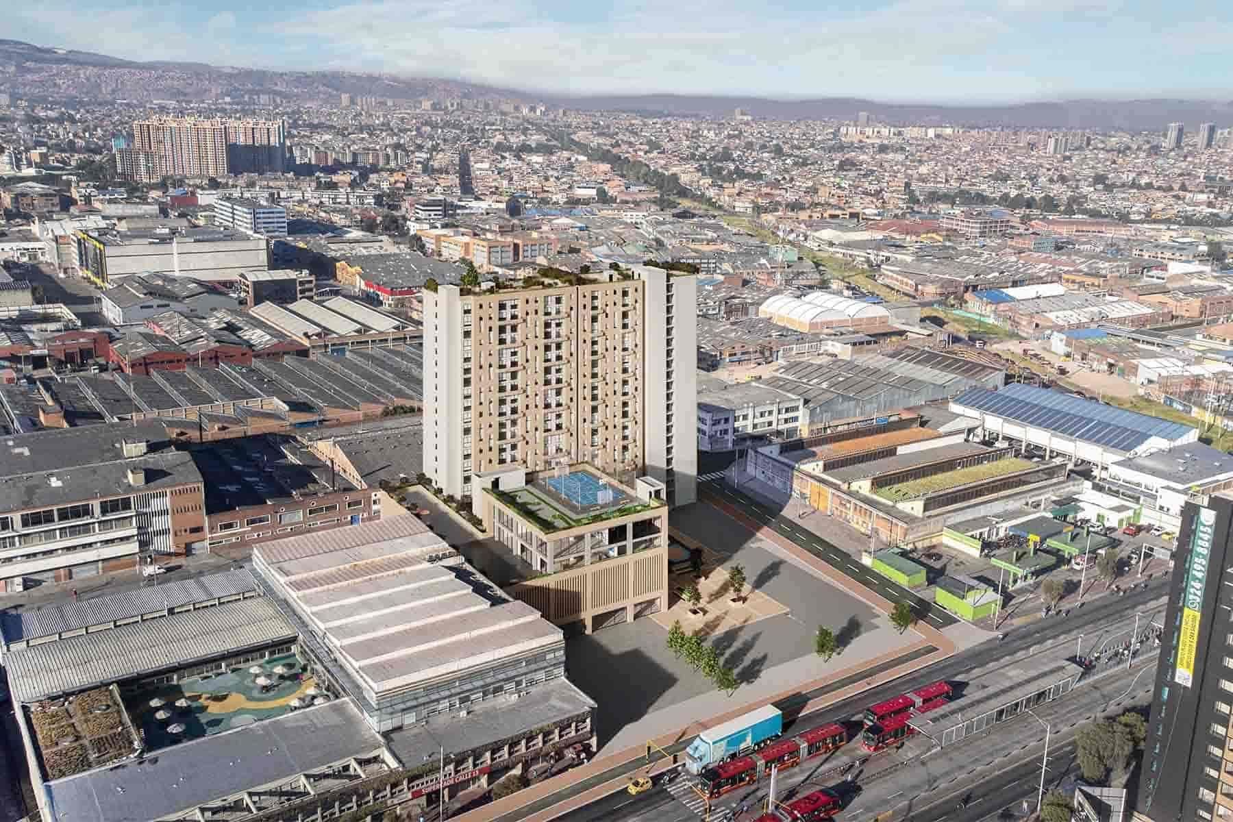 Una vista aérea de una ciudad con un gran edificio en el medio.