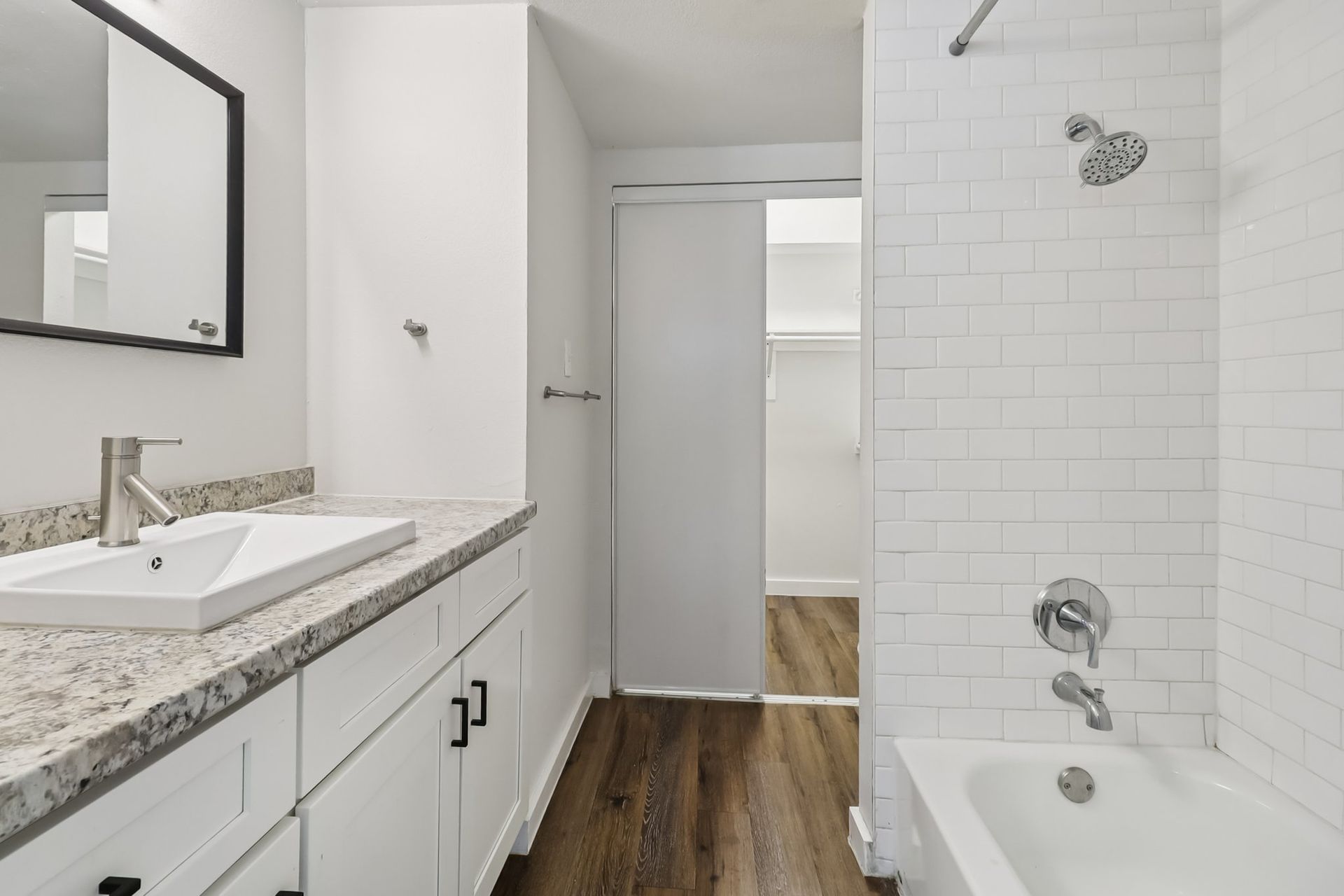 Photo of a bathroom with a shower/bathtub combo