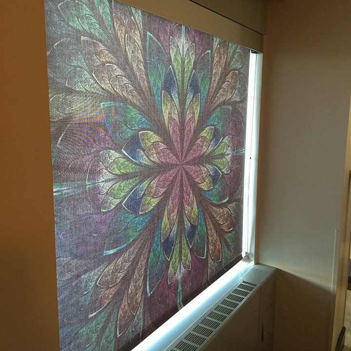 A window with a colorful flower design on it.