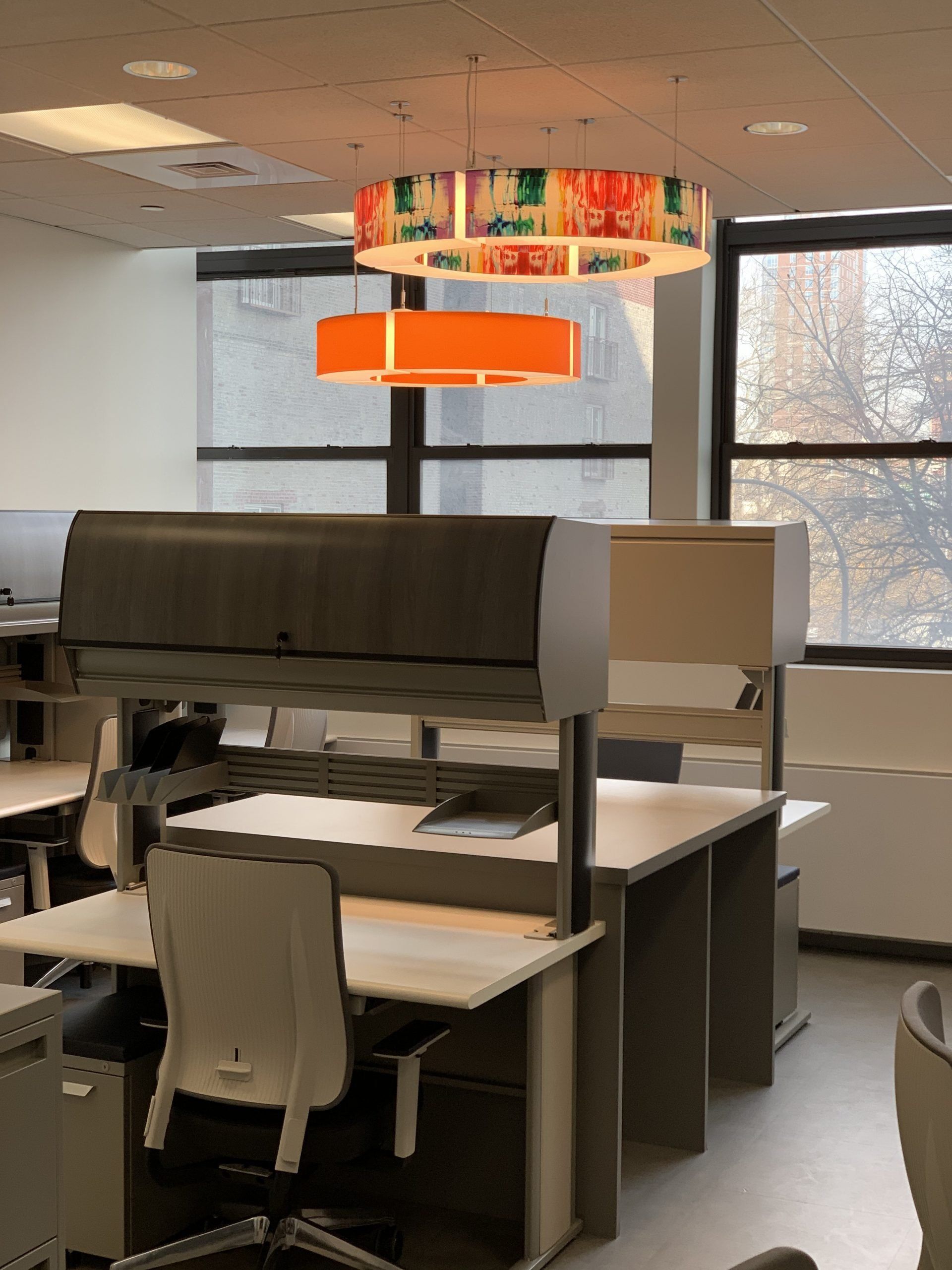 A room with a lot of desks and chairs