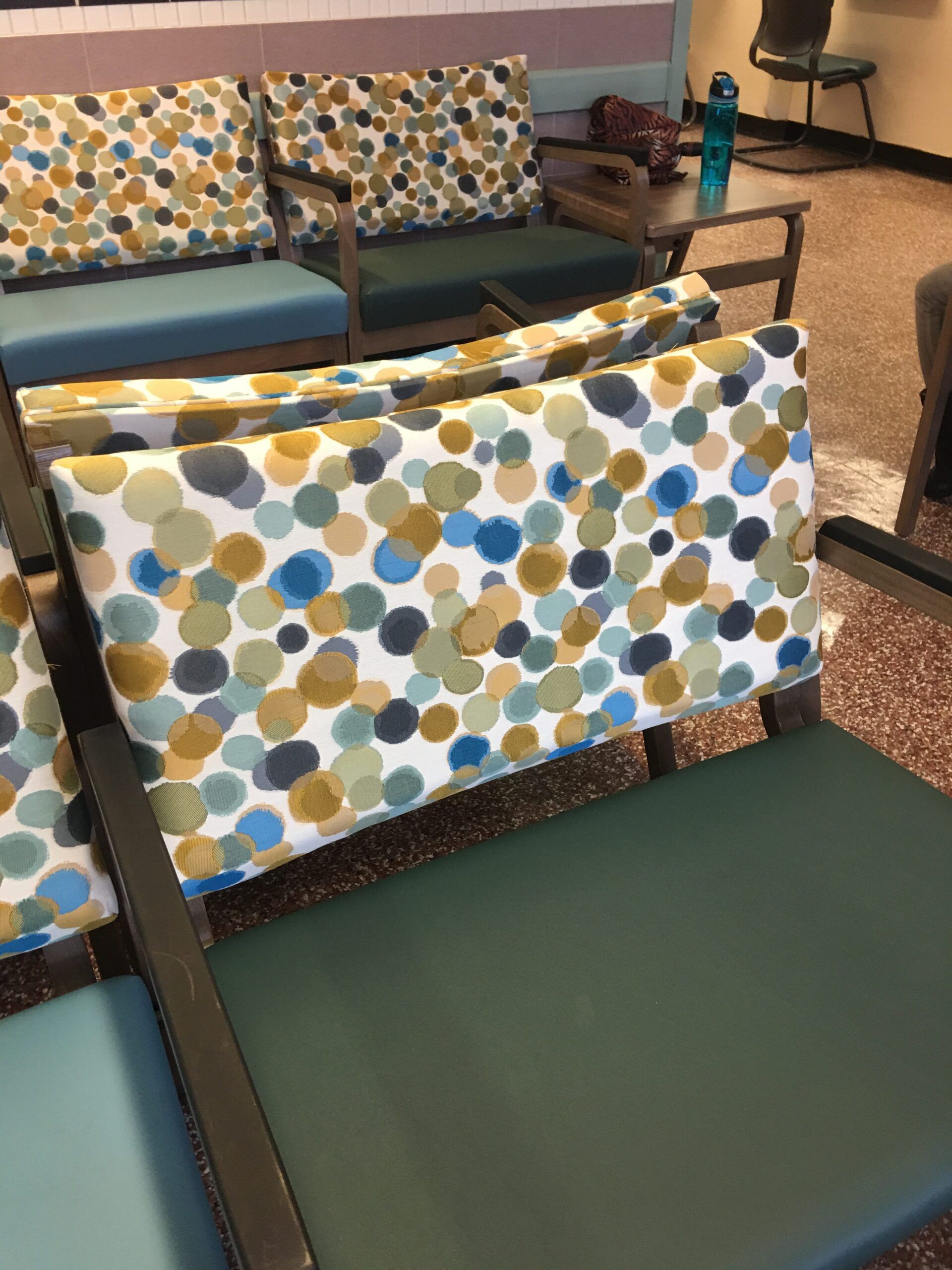 A row of chairs with polka dots on them