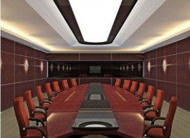 A conference room with a long table and chairs