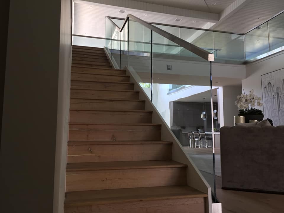 Boca Raton, FL -  Interior glass railing stairs